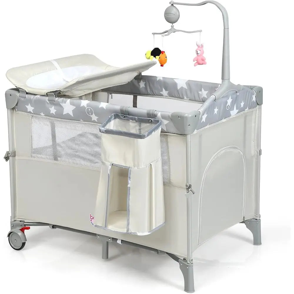 Portable Play Yard, Bassinet, Changing Table, and Music