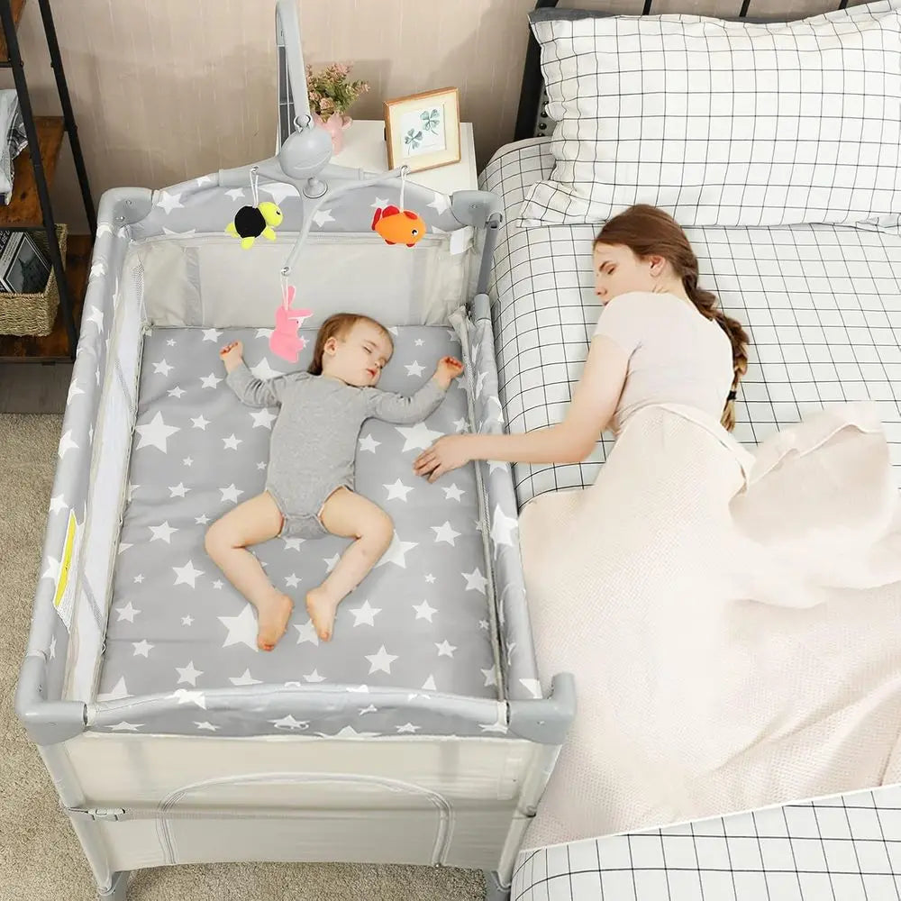 Portable Play Yard, Bassinet, Changing Table, and Music