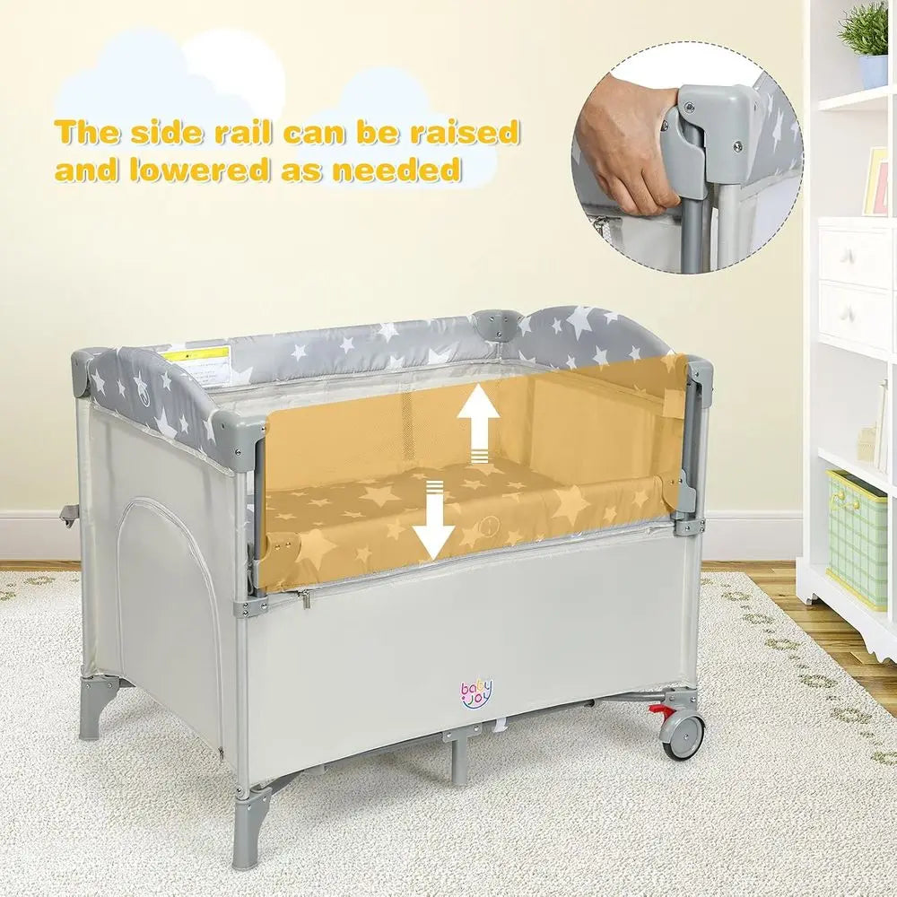 Portable Play Yard, Bassinet, Changing Table, and Music